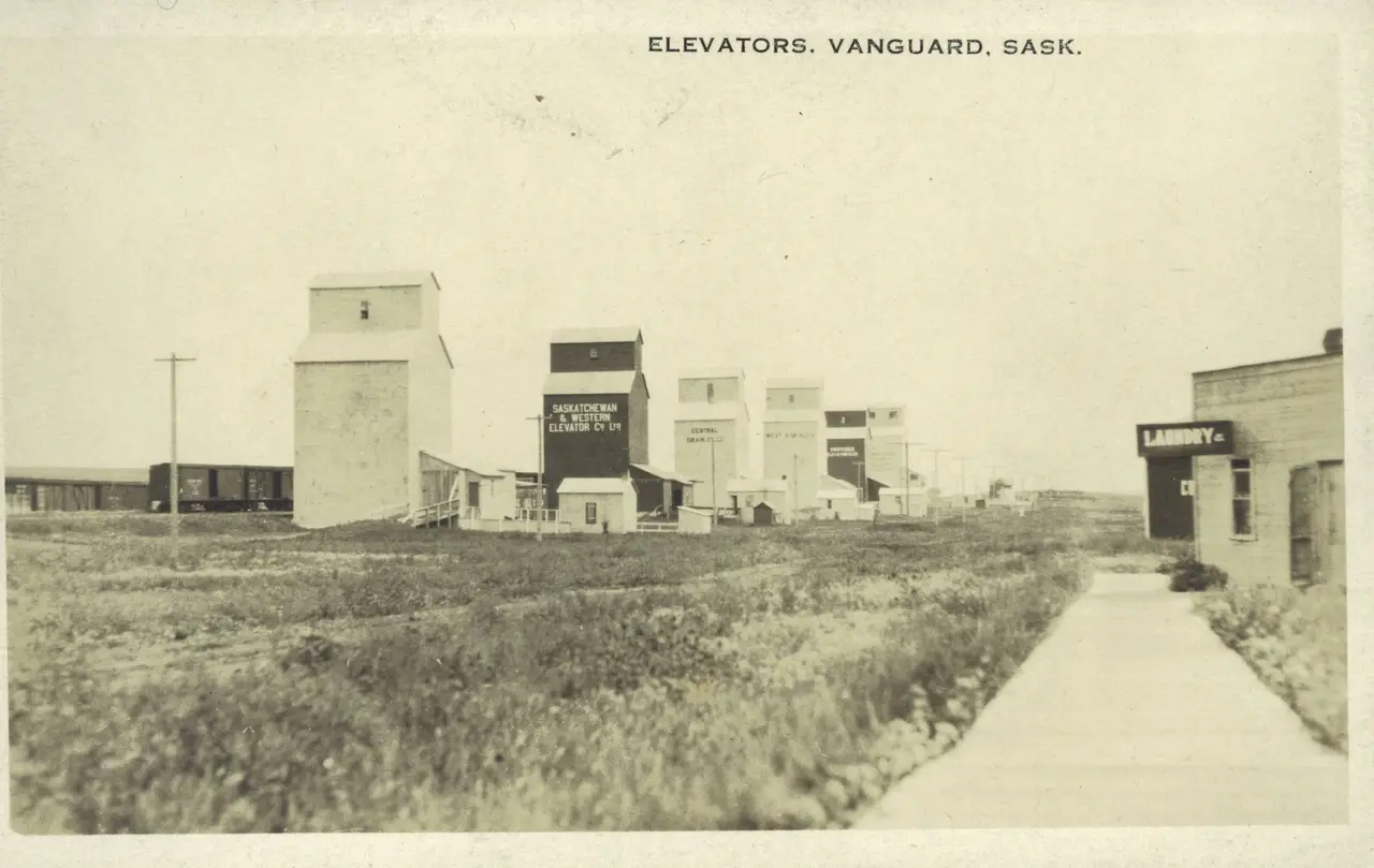 Grain elevators along the tracks, Vanguard, about 1920